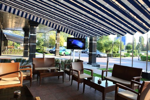 Summer terrace in a restaurant at the Uzhgorod hotel in Uzhgorod. Cheap accommodation