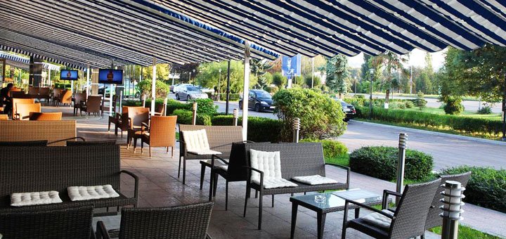 Summer terrace in a restaurant at the Uzhgorod hotel in Uzhgorod. Discounted Stay