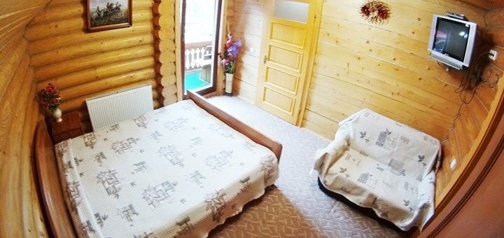 Готель «У Василини та Романа» у полянці. Забронювати номер зі знижкою. Недорогий відпочинок у Буковелі. Знижки на відпочинок у Карпатах.