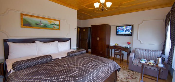 Номер трехместный в отеле «Fides hotel» в Стамбуле. Бронируйте по акции.