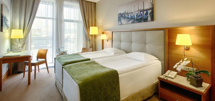Номер в отеле «Apartments City Hotel». Заброниовать номер со скидкой. Отели в центре Киева.