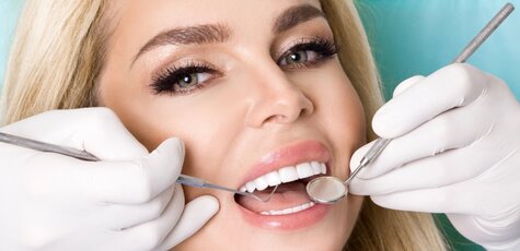 Скидка до 68% на установку виниров от «KievDental»