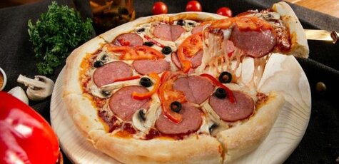 Скидка 50% на меню пиццы в пиццерии «Pizza Rich»