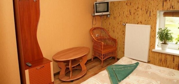 https://cdn1.pokupon.ua/uploaded/new_campaign_pictures/687538/data/main620x292/Hotel-Mlyn-photos-Room.jpg?1588235275