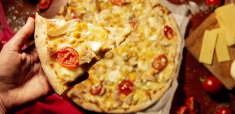 Скидка 50% на меню пиццы от «Grizzli Pizza»