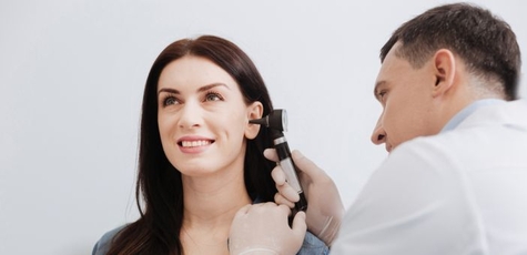 Examination by an otolaryngologist in "astramedica"