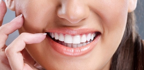 Ultrasonic cleaning and polishing of teeth 