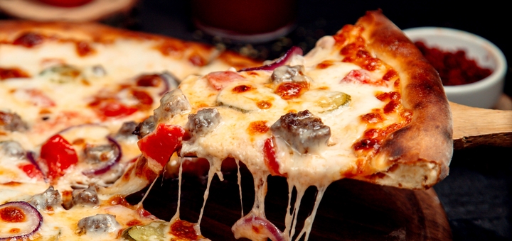 https://cdn1.pokupon.ua/uploaded/new_campaign_pictures/918961/data/main720x340/slice-crispy-pizza-with-meat-cheese.jpg?1730204713