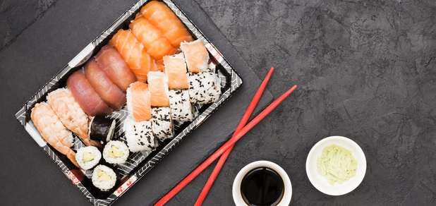 https://cdn1.pokupon.ua/uploaded/new_campaign_pictures/931495/data/main620x292/vivid-asian-fish-rolls-tray-chopsticks-with-soya-sauce-wasabi-back-concrete-floor.jpg?1740580951