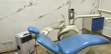 Treatment of caries with filling in Deutsch Dent