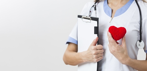 Cardiologist examination with ECG at the Razom