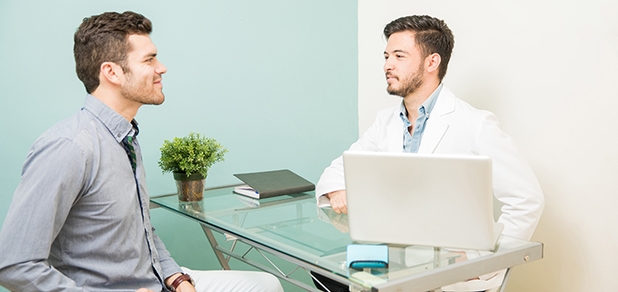 https://cdn1.pokupon.ua/uploaded/new_campaign_pictures/965276/data/main620x292/profile-view-young-male-nutritionist-talking-patient-his-office-health-spa-clinic.jpg?1787044576